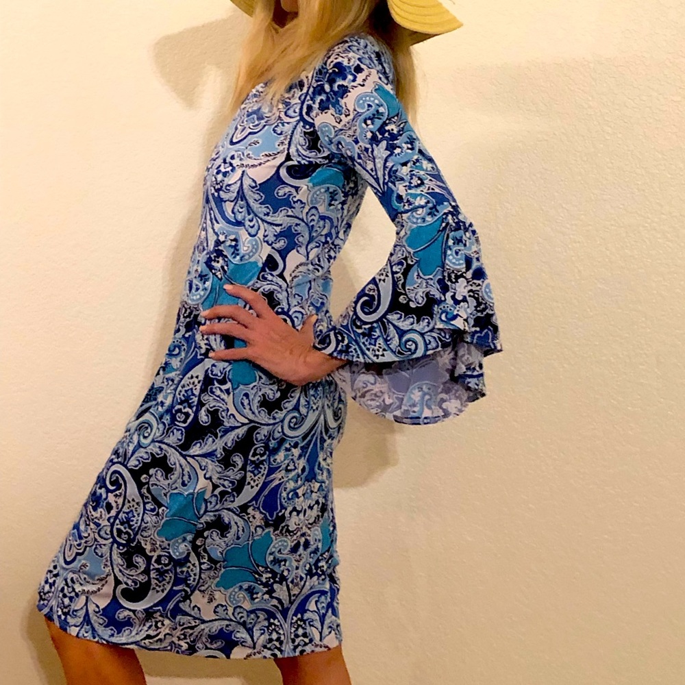 Quality bohemian stretch dress with flare sleeves.